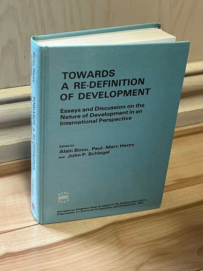 Towards a re-definition of development: Essays and discussions on the nature of development in an international perspective by Alain Birou, Paul-Marc Henry, and John P. Schlegel