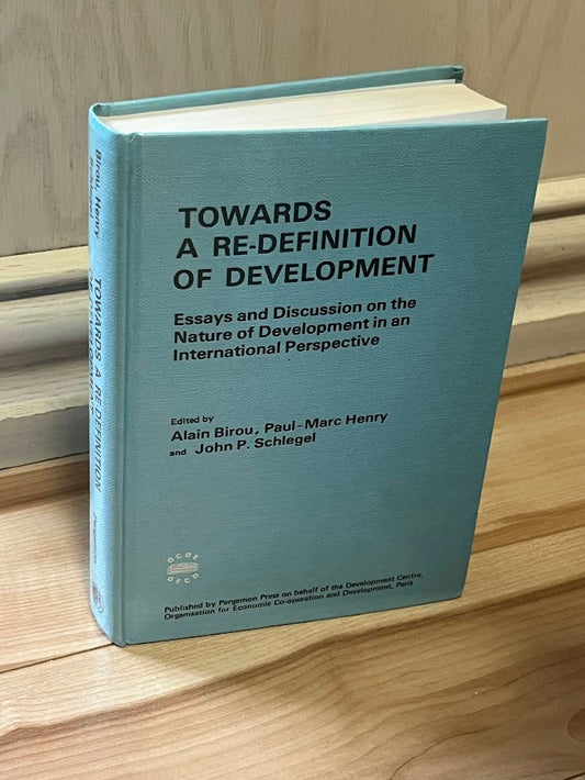 Towards a re-definition of development: Essays and discussions on the nature of development in an international perspective by Alain Birou, Paul-Marc Henry, and John P. Schlegel