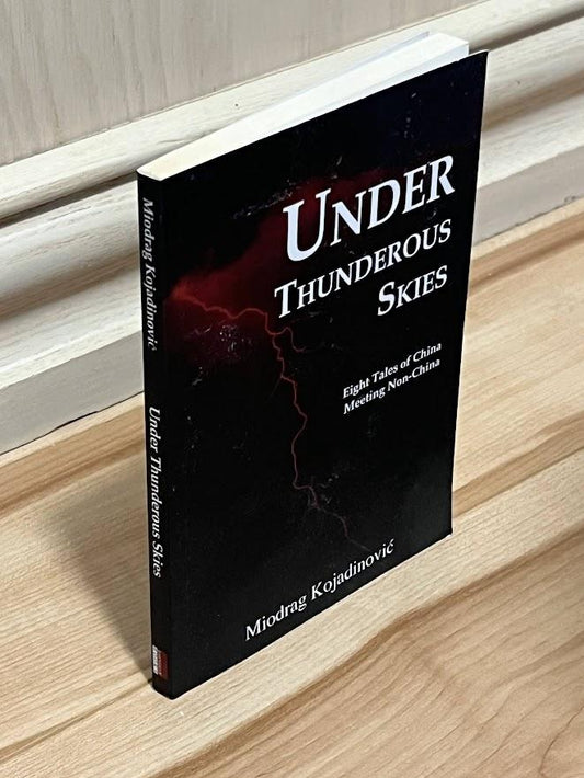 Under Thunderous Skies: Eight Tales of China Meeting Non-China by Miodrag Kojadinovic